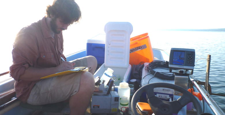 Water Sampling from the Boat at Higgins Lake in Roscommon County MI
